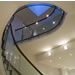 Curved staircase with suspended ceiling
